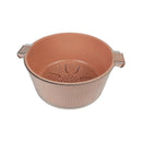 Copper-colored colander with handles on a white background