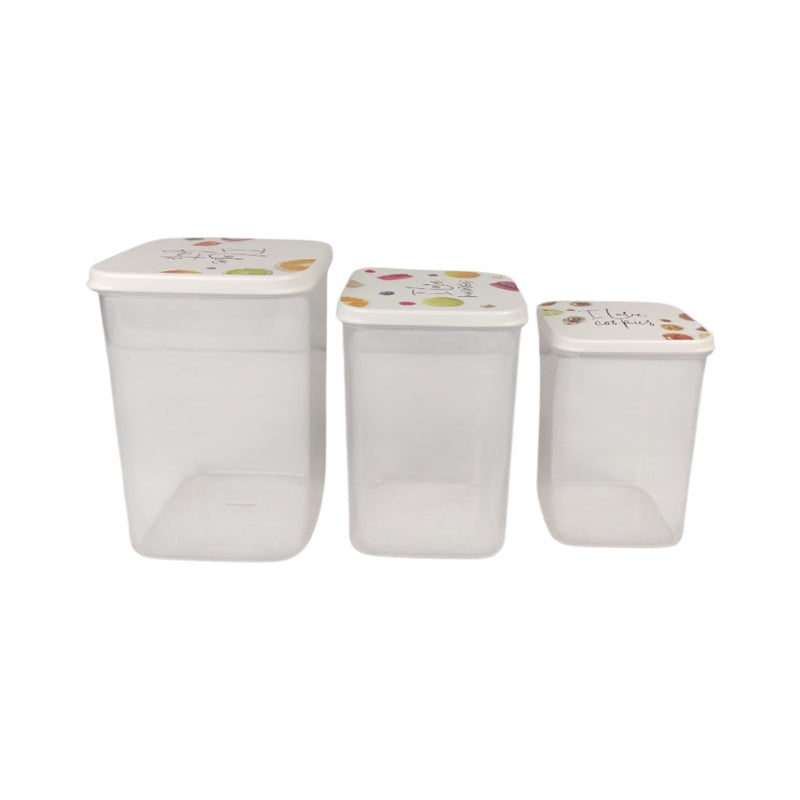 Set of three clear plastic storage containers with decorative lids on a white background