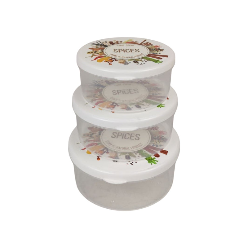 Stack of three white spice containers with decorative labels on a white background