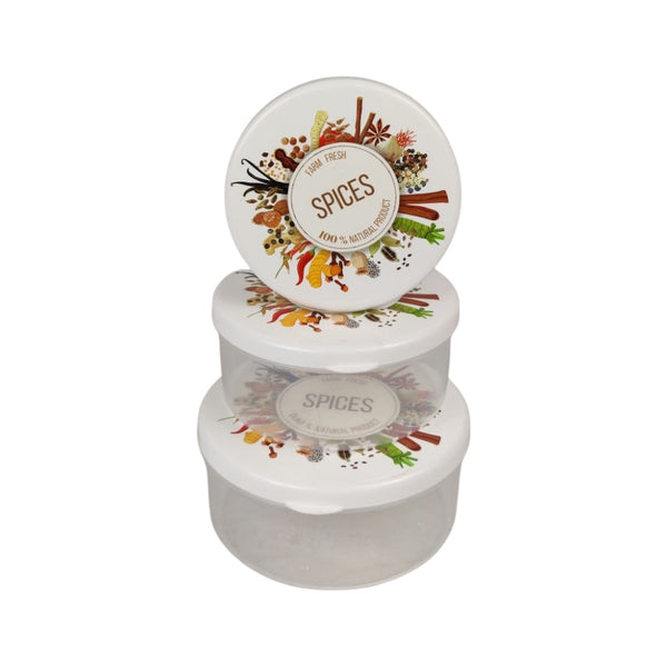 Stack of spice containers with decorative labels on a white background
