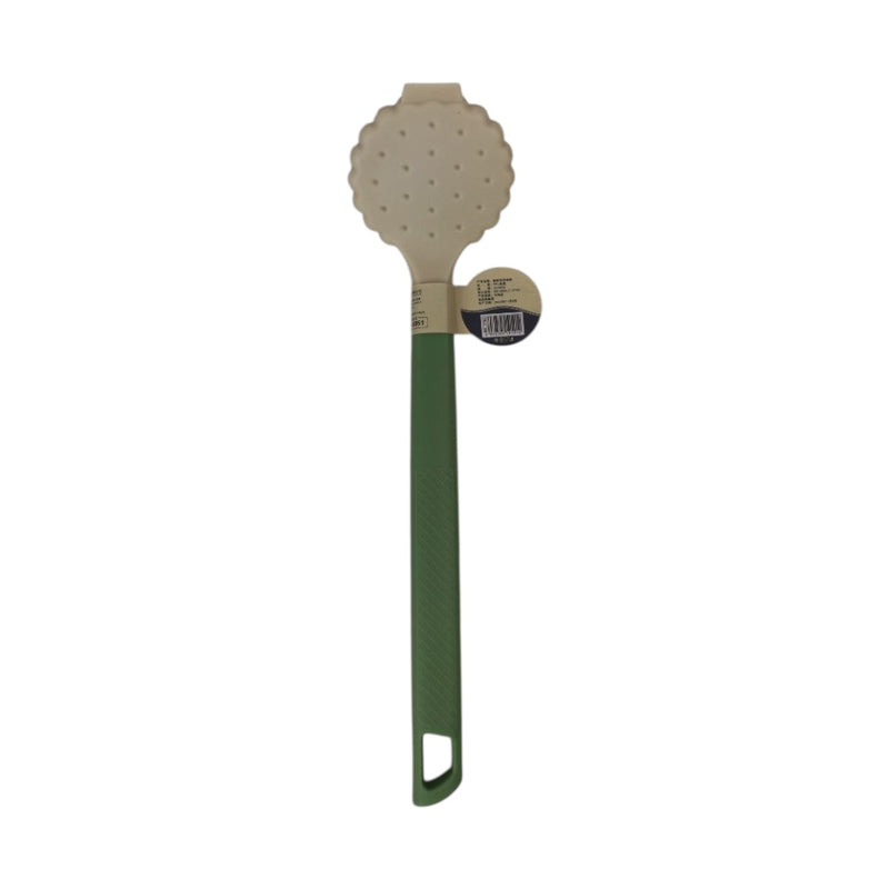 Silicone spoon with green handle on a white background
