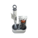 Cleaning brush set with holder and scrubber in a clear bag on a white background