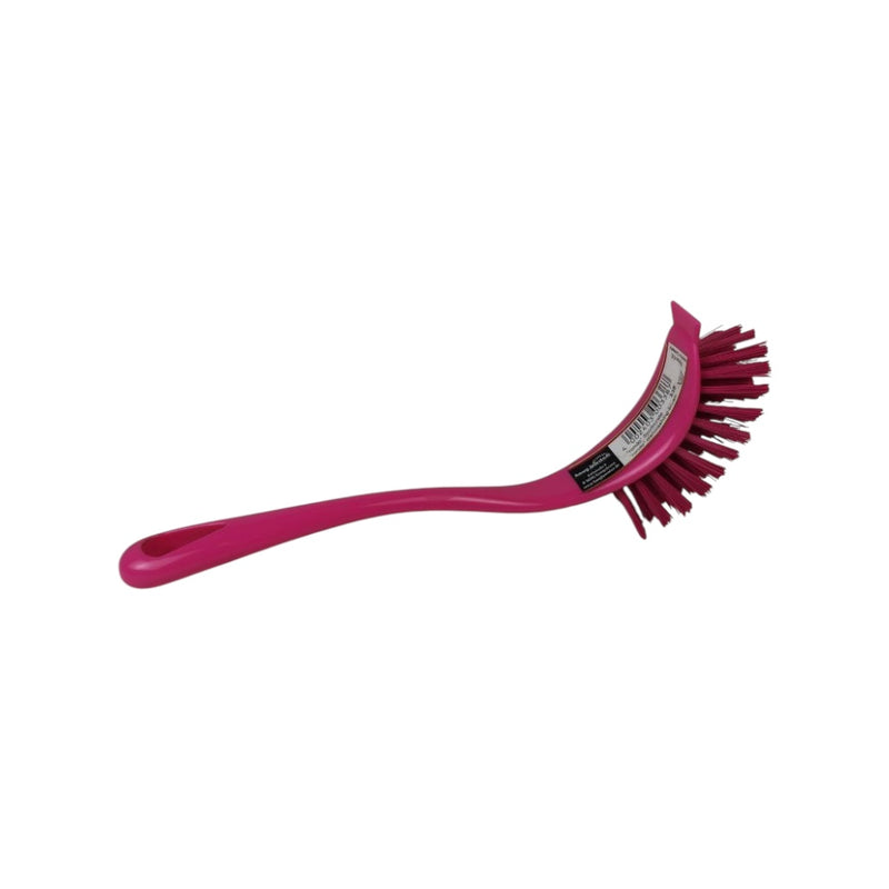 Pink dish brush on a white background