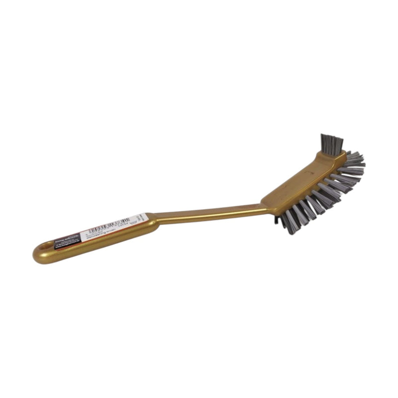 Brass grill brush with wire bristles on a white background