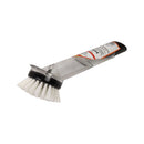 Cleaning brush with bristles in clear packaging on a white background