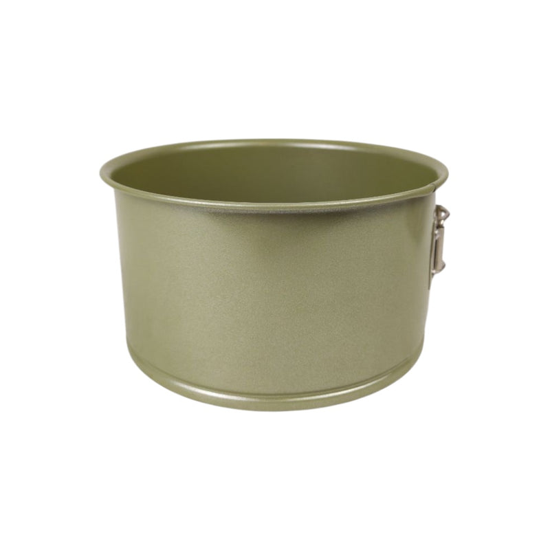 Green metal cup on a white background