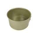 Green metal cake pan on a white background