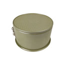 Green metal tin with a textured lid on a white background