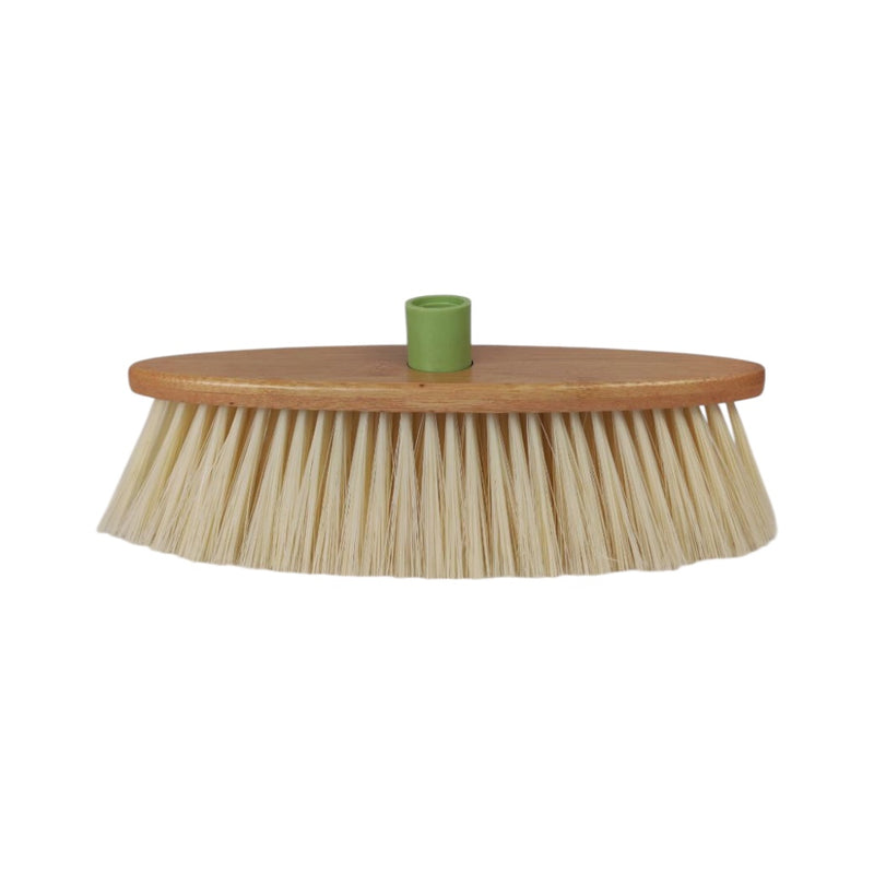 Round broom with wooden handle and natural bristles on a white background