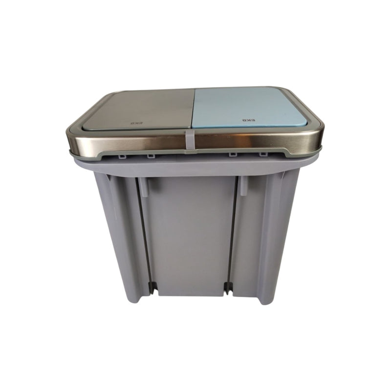 Two-toned trash bin with metallic lid on a white background
