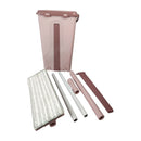 Pink cleaning bucket with various cleaning tools on a white background