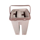 Pink plastic bucket with a handle on a white background