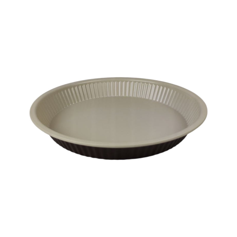 Round baking tray with ribbed interior on a white background available at cupindy.com
