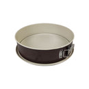 Round metal baking pan with a springform base on a white background available at cupindy.com