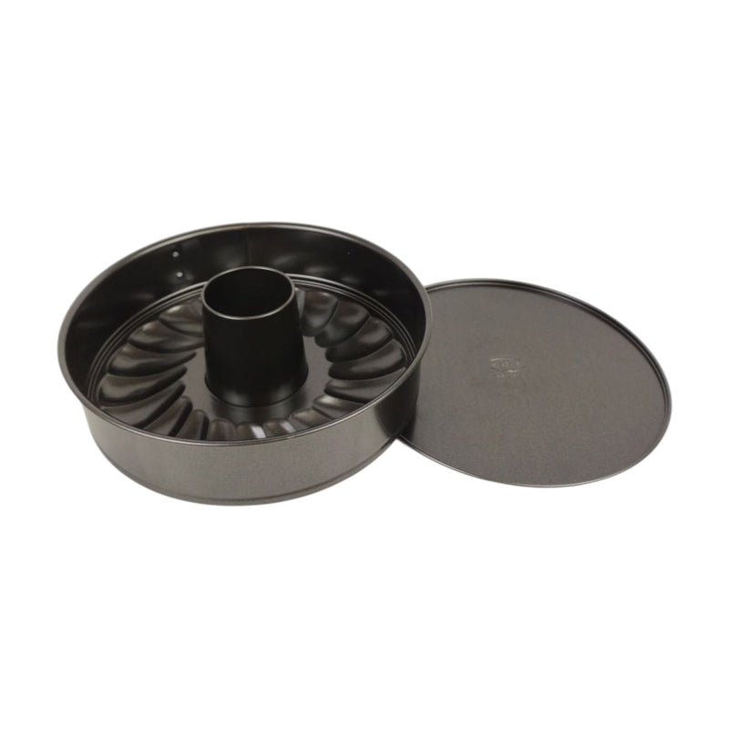 Metal bundt cake pan on a white background available at cupindy.com