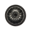 Metallic bundt cake pan on a white background available at cupindy.com