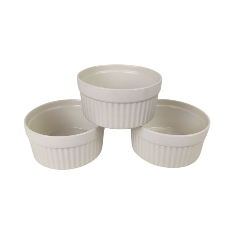 Three white ramekins with ribbed texture on a white background available at cupindy.com