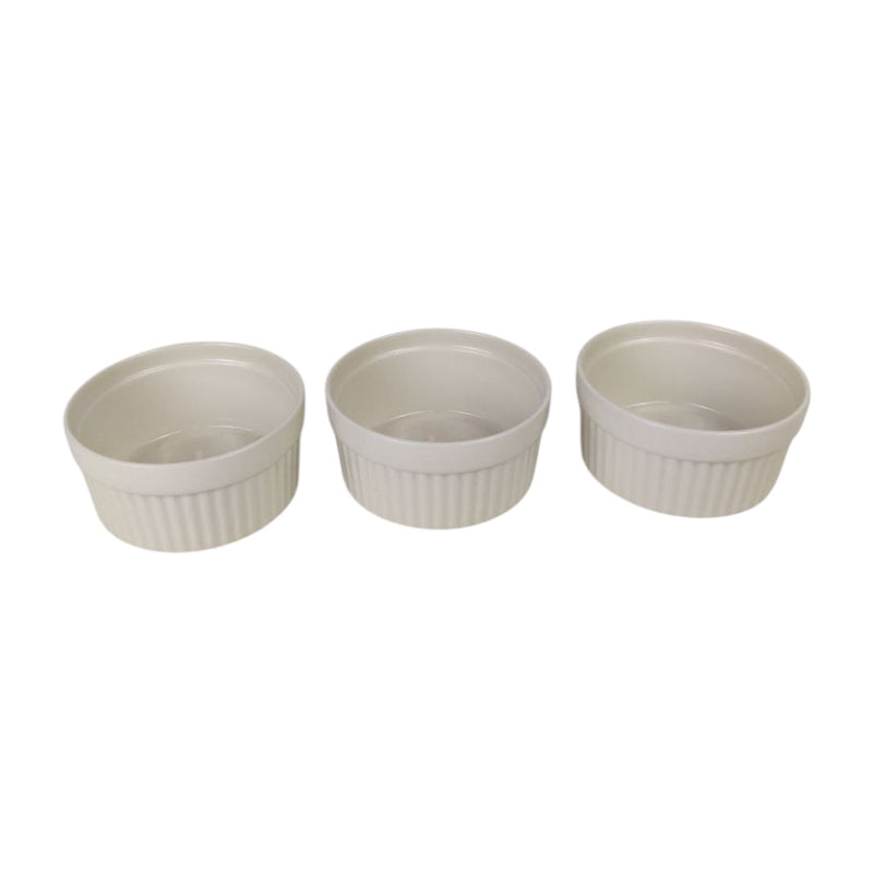 Three white ramekins with ribbed texture on a white background available at cupindy.com