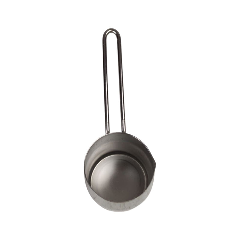Metal measuring cup with handle on a white background
