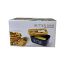 Butter dish packaging with a blue container and wooden cover on a white background