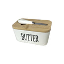 Butter container with wooden lid on a white background