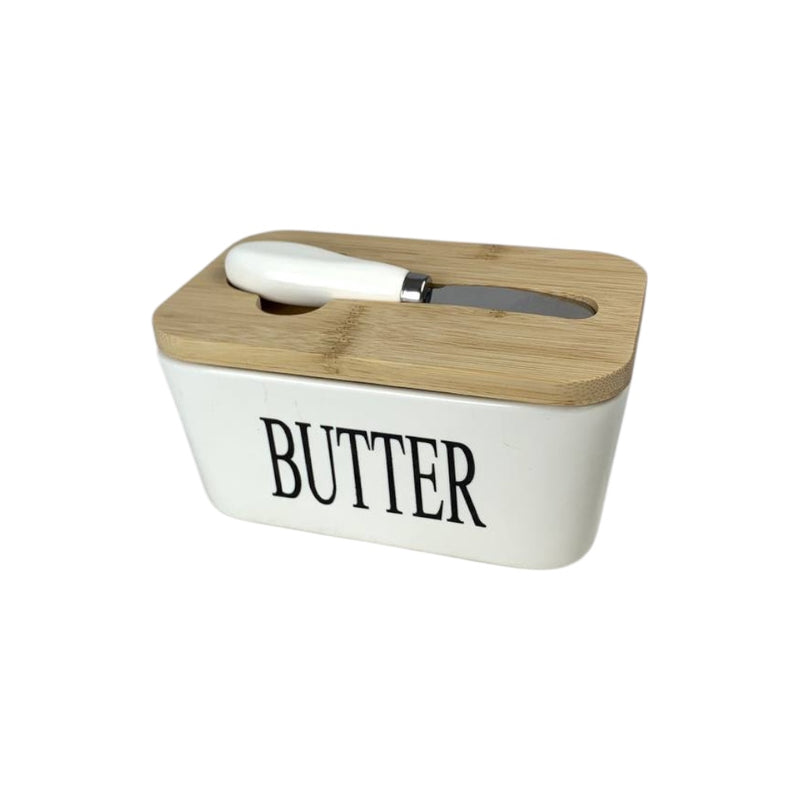 Butter container with wooden lid on a white background