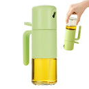 Green oil dispenser with a clear container of oil on a white background