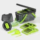 Set of green and black kitchen tools including a grater, slicer, and peeler on a white background.