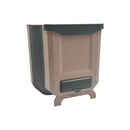 Side view of foldable hanging trash bin in beige and grey with built-in bag dispenser, compact for kitchen or car use