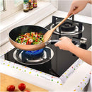 Person cooking vegetables in a frying pan on a gas stove with a wooden spoon.