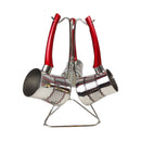 Set of three metal ladles with red handles on a white background