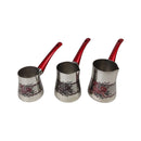Three metallic coffee pots with red handles on a white background