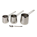 Set of three stainless steel measuring cups with handles on a white background