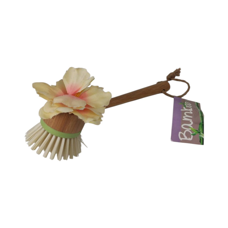Bamboo scrubber with a decorative flower on a white background