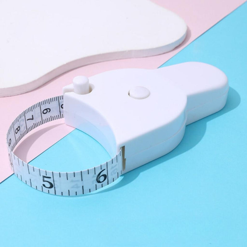 Tailor-style measuring tape with ergonomic grip design
