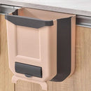 Foldable bin with garbage bag slot for convenient waste disposal