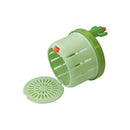 Innovative sink strainer basket with press-to-open lid for hygienic waste removal.
