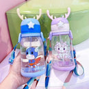 Pink kids water bottle with star button and unicorn print | Cupindy