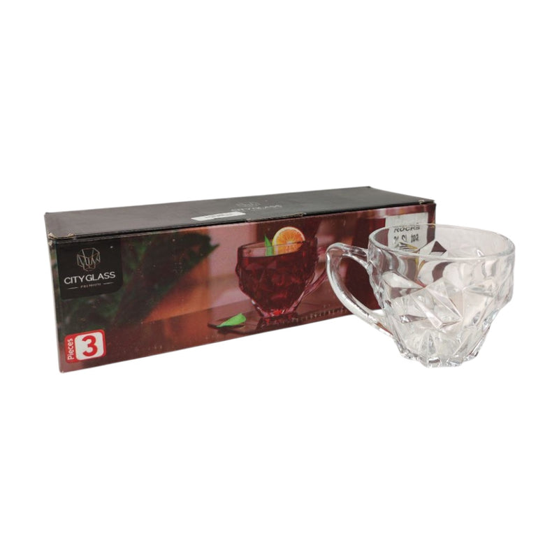 Clear glass mug with handle in front of City Glass branded box on a white background