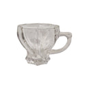 Clear glass mug with textured design on a white background