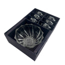 Set of clear glass bowls in a black box on a white background