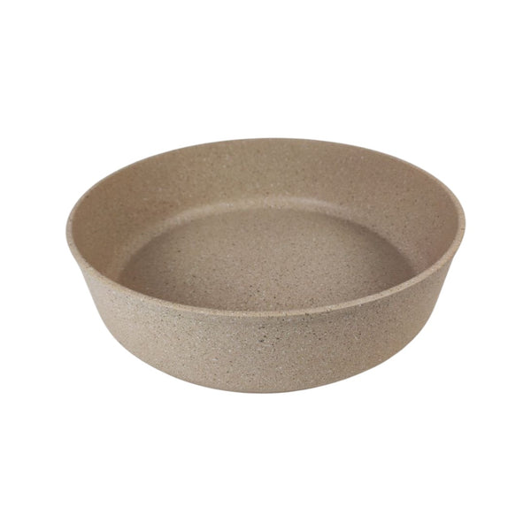 Beige ceramic bowl on a white background