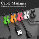 Multi-color cable holders with adhesive back for easy mounting