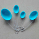 Plastic measuring spoon set in multiple sizes, essential for precise baking | Cupindy
