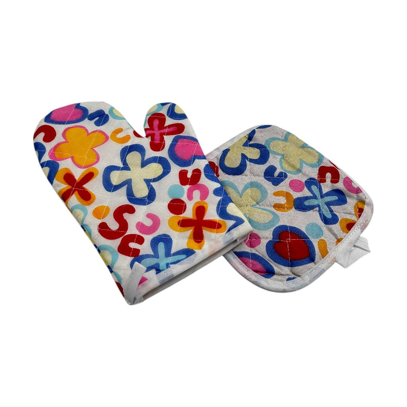Colorful quilted kitchen oven mitt and pot holder set with multicolor floral and heart pattern on white background