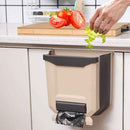 Over-the-cabinet door hanging trash bin for easy access