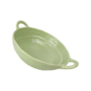 Green ceramic oval dish with handles on a white background