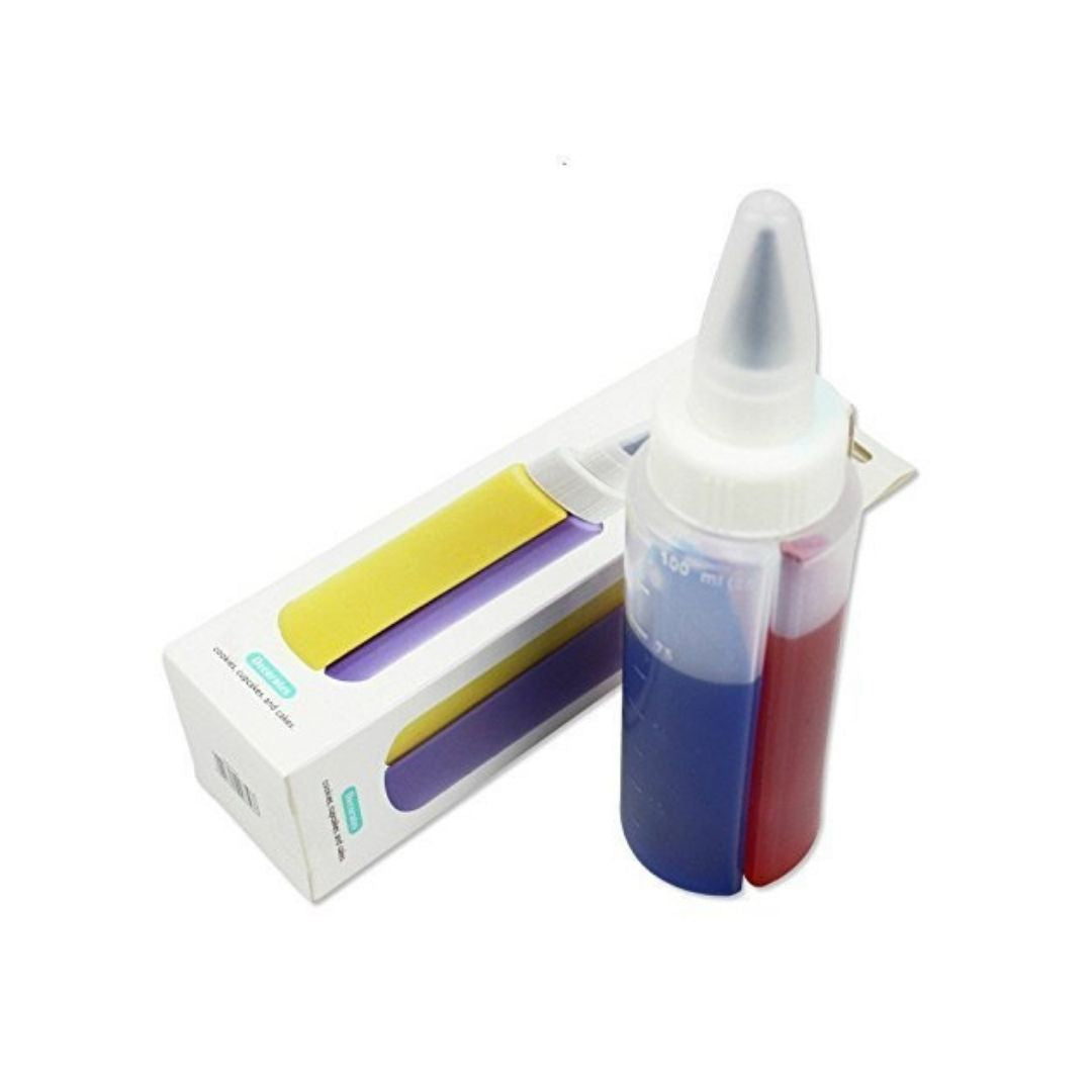 Two bottles with colorful liquid next to a white box on a white background