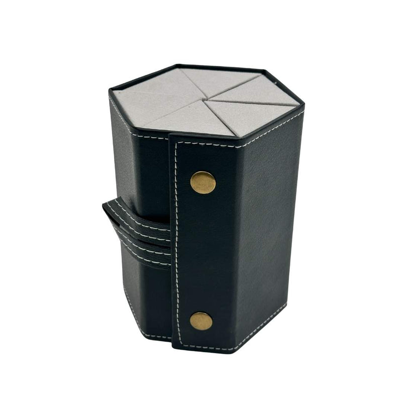 Black hexagonal leather case with gold studs on a white background