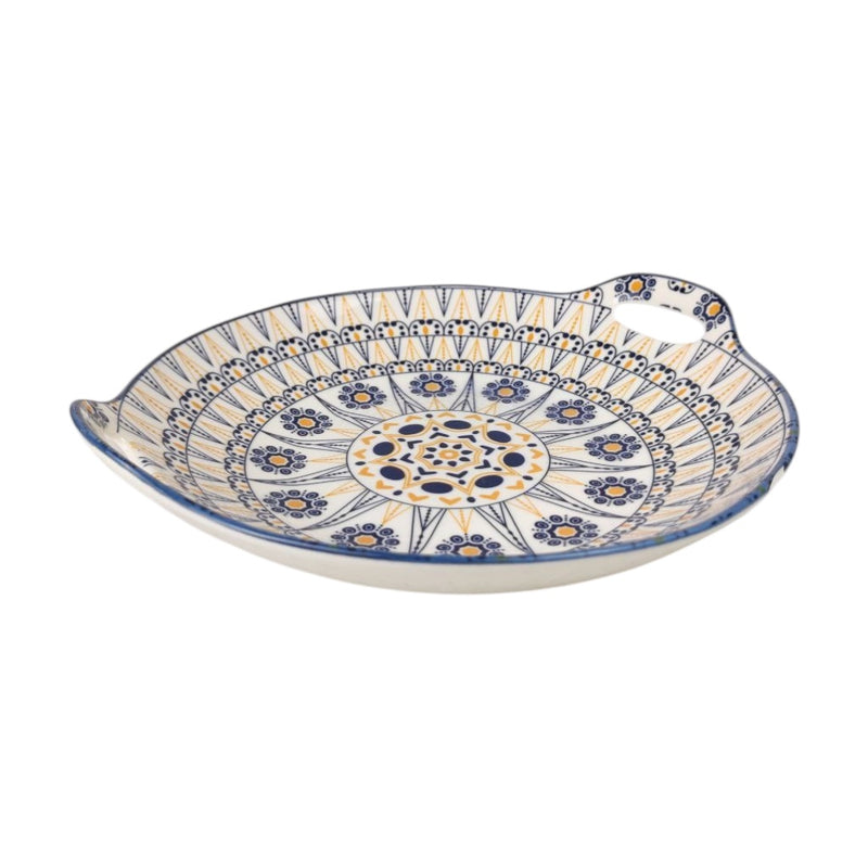 Decorative ceramic plate with blue and yellow patterns on a white background